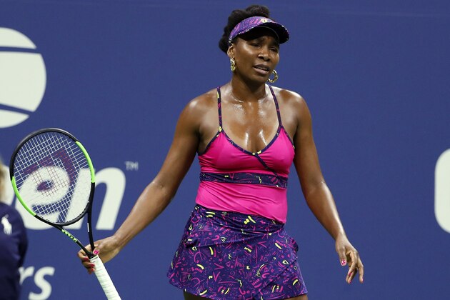 Venus Williams reacts during her third-round against Serena Williams at the U.S. Open tennis tournament Friday, Aug. 31, 2018, in New York. (AP Photo/Adam Hunger)