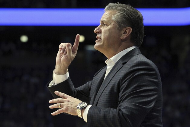 Kentucky coach John Calipari talks to his team during the second half of an NCAA college basketball game against VMI in Lexington, Ky., Sunday, Nov. 18, 2018. Kentucky won 92-82. (AP Photo/James Crisp)