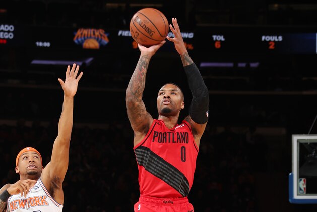 NEW YORK, NY - NOVEMBER 20:  Damian Lillard #0 of the Portland Trail Blazers shoots the ball against the New York Knicks on November 20, 2018 at Madison Square Garden in New York City, New York.  NOTE TO USER: User expressly acknowledges and agrees that, by downloading and or using this photograph, User is consenting to the terms and conditions of the Getty Images License Agreement. Mandatory Copyright Notice: Copyright 2018 NBAE  (Photo by Nathaniel S. Butler/NBAE via Getty Images)
