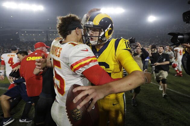 Los Angeles Rams quarterback Jared Goff, right, hugs Kansas City Chiefs quarterback Patrick Mahomes, left, after an NFL football game, Monday, Nov. 19, 2018, in Los Angeles. The Rams won 54-51. (AP Photo/Marcio Jose Sanchez)
