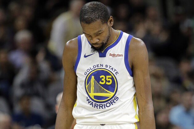 Golden State Warriors forward Kevin Durant (35) walks down court after a play during the second half of an NBA basketball game against the San Antonio Spurs, Sunday, Nov. 18, 2018, in San Antonio. San Antonio won 104-92. (AP Photo/Eric Gay)