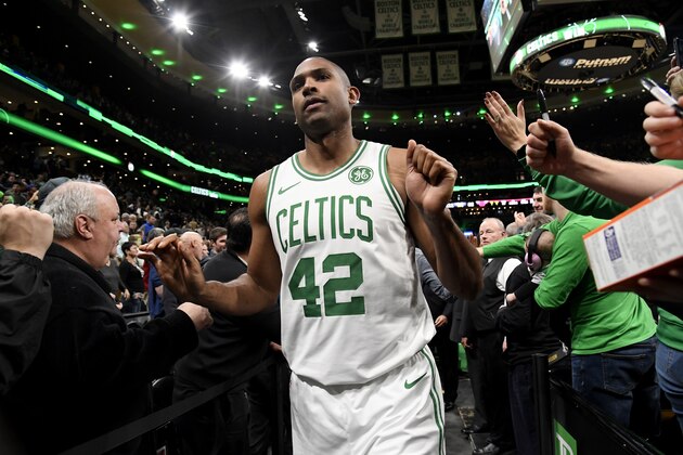 BOSTON, MA - NOVEMBER 14: Al Horford #42 of the Boston Celtics high-fives fans during a game against the Chicago Bulls on November 14, 2018 at the TD Garden in Boston, Massachusetts.  NOTE TO USER: User expressly acknowledges and agrees that, by downloading and or using this photograph, User is consenting to the terms and conditions of the Getty Images License Agreement. Mandatory Copyright Notice: Copyright 2018 NBAE  (Photo by Brian Babineau/NBAE via Getty Images)