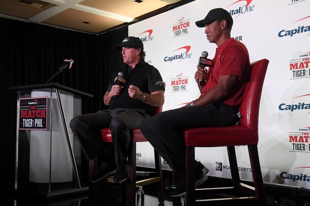 LAS VEGAS, NV - NOVEMBER 20:  (L-R) Phil Mickelson and Tiger Woods speak with the media during a press conference before The Match at Shadow Creek Golf Course on November 20, 2018 in Las Vegas, Nevada.  (Photo by Harry How/Getty Images for The Match)
