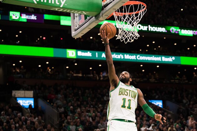 BOSTON, MA - NOVEMBER 21: Kyrie Irving #11 of the Boston Celtics drives to the basket during a game at TD Garden on November 21, 2018 in Boston, Massachusetts.  NOTE TO USER: User expressly acknowledges and agrees that, by downloading and or using this photograph, User is consenting to the terms and conditions of the Getty Images License Agreement. (Photo by Kathryn Riley/Getty Images)