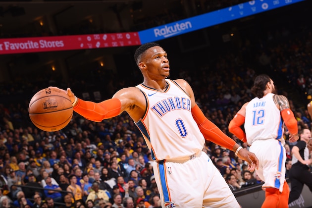 OAKLAND, CA - NOVEMBER 21: Russell Westbrook #0 of the Oklahoma City Thunder handles the ball during the game against the Golden State Warriors on November 21, 2018 at ORACLE Arena in Oakland, California. NOTE TO USER: User expressly acknowledges and agrees that, by downloading and or using this photograph, user is consenting to the terms and conditions of Getty Images License Agreement. Mandatory Copyright Notice: Copyright 2018 NBAE (Photo by Noah Graham/NBAE via Getty Images)