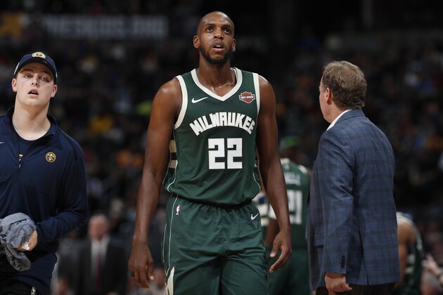 Milwaukee Bucks forward Khris Middleton (22) in the second half of an NBA basketball game Sunday, Nov. 11, 2018, in Denver. Milwaukee won 121-114. (AP Photo/David Zalubowski)