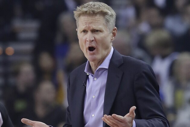 Golden State Warriors coach Steve Kerr gestures toward an official during the first half of the team's NBA basketball game against the Oklahoma City Thunder in Oakland, Calif., Wednesday, Nov. 21, 2018. (AP Photo/Jeff Chiu)