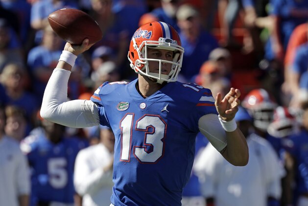 Florida quarterback Feleipe Franks looks for a receiver against Idaho during the first half of an NCAA college football game, Saturday, Nov. 17, 2018, in Gainesville, Fla. (AP Photo/John Raoux)