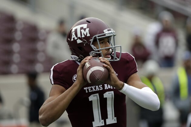 Texas A&M quarterback Kellen Mond (11) warms up before an NCAA college football game Saturday, Nov. 10, 2018, in College Station, Texas. (AP Photo/David J. Phillip)