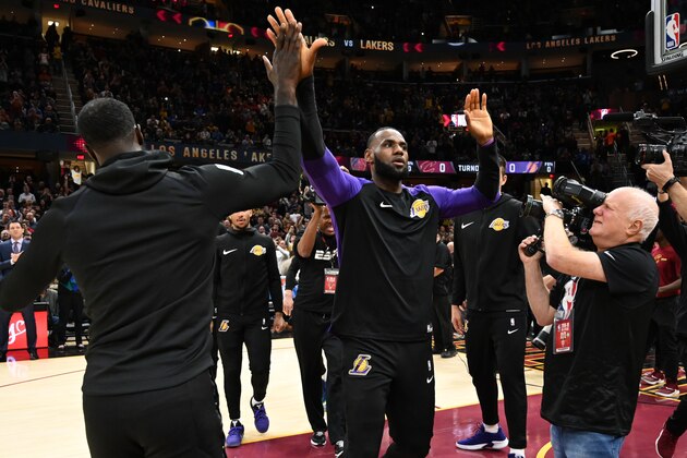 CLEVELAND, OH - NOVEMBER 21: LeBron James #23 of the Los Angeles Lakers during player introductions prior to the game against the Cleveland Cavaliers at Quicken Loans Arena on November 21, 2018 in Cleveland, Ohio. NOTE TO USER: User expressly acknowledges and agrees that, by downloading and/or using this photograph, user is consenting to the terms and conditions of the Getty Images License Agreement. (Photo by Jason Miller/Getty Images) CLEVELAND, OH - NOVEMBER 21: LeBron James #23 of the Los Angeles Lakers during player introductions prior to the game against the Cleveland Cavaliers at Quicken Loans Arena on November 21, 2018 in Cleveland, Ohio. NOTE TO USER: User expressly acknowledges and agrees that, by downloading and/or using this photograph, user is consenting to the terms and conditions of the Getty Images License Agreement. (Photo by Jason Miller/Getty Images)