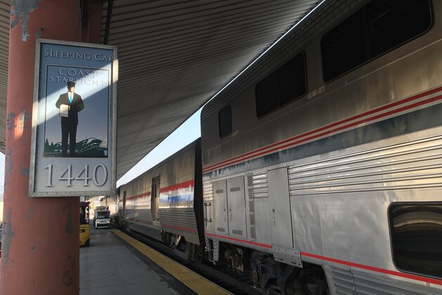 This Dec. 16, 2017 photo shows Amtrak's Coast Starlight train at Union Station in Los Angeles. Skip the hassles of traffic and airport security and hop on a coastal trek offering an old-fashioned, unplugged escape with scenic views of the Pacific Northwest. Seattle is the destination on Amtrak's 35-hour Coast Starlight sleeper train, but the relaxing journey is the main attraction.(AP Photo/Nicole Evatt)