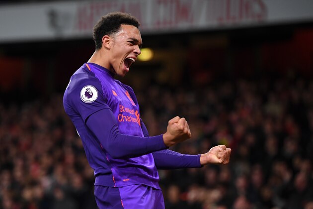 LONDON, ENGLAND - NOVEMBER 03:  Trent Alexander-Arnold of Liverpool celebrates after James Milner of Liverpool (not pictured) scores his sides first goal during the Premier League match between Arsenal FC and Liverpool FC at Emirates Stadium on November 3, 2018 in London, United Kingdom.  (Photo by Michael Regan/Getty Images)