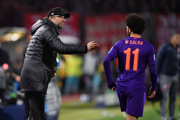 Liverpool's German coach Jurgen Klopp (L) gives instructions to Liverpool's Egyptian forward Mohamed Salah during the UEFA Champions League Group C second-leg football match between Red Star Belgrade and Liverpool FC at the Rajko Mitic Stadium in Belgrade on November 6, 2018. (Photo by Andrej ISAKOVIC / AFP)        (Photo credit should read ANDREJ ISAKOVIC/AFP/Getty Images)