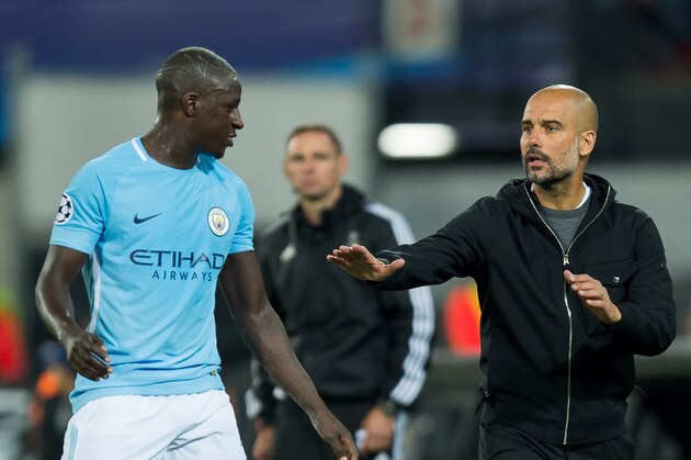 ROTTERDAM, NETHERLANDS - SEPTEMBER 13: Benjamin Mendy of Manchester City and Head coach Pep Guardiola of Manchester City looks on during the UEFA Champions League match between Feyenoord Rotterdam and Manchester City at Stadion Feijenoord on September 13, 2017 in Rotterdam, Netherlands. (Photo by TF-Images/TF-Images via Getty Images)