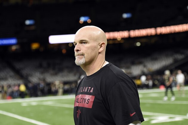 Atlanta Falcons head coach Dan Quinn walks onto the field before an NFL football game against the New Orleans Saints in New Orleans, Thursday, Nov. 22, 2018. (AP Photo/Bill Feig)