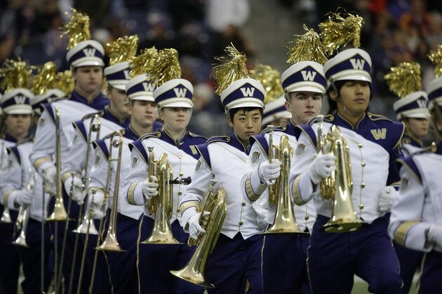 Members of the Washington Husky marching band perform before an NCAA college football game Saturday, Nov. 12, 2016, in Seattle. (AP Photo/Elaine Thompson)