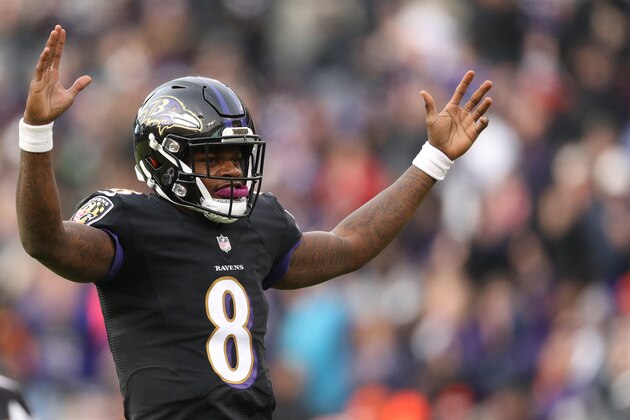 BALTIMORE, MD - NOVEMBER 18: Quarterback Lamar Jackson #8 of the Baltimore Ravens celebrates a Ravens touchdown against the Cincinnati Bengals in the third quarter at M&T Bank Stadium on November 18, 2018 in Baltimore, Maryland. (Photo by Patrick Smith/Getty Images)