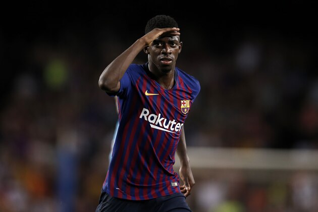 Barcelona forward Ousmane Dembele celebrates after scoring his side's second goal during the group B Champions League soccer match between FC Barcelona and PSV Eindhoven at the Camp Nou stadium in Barcelona, Spain, Tuesday, Sept. 18, 2018. (AP Photo/Manu Fernandez)
