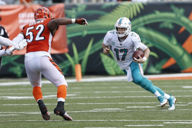 Miami Dolphins quarterback Ryan Tannehill (17) scramble against the Cincinnati Bengals during the second half of an NFL football game in Cincinnati, Sunday, Oct. 7, 2018. (AP Photo/Frank Victores)