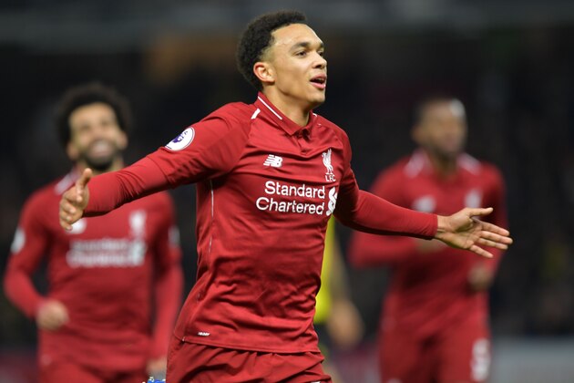 Liverpool's English defender Trent Alexander-Arnold celebrates after scoring their second goal during the English Premier League football match between Watford and Liverpool at Vicarage Road Stadium in Watford, north of London on November 24, 2018. (Photo by OLLY GREENWOOD / AFP) / RESTRICTED TO EDITORIAL USE. No use with unauthorized audio, video, data, fixture lists, club/league logos or 'live' services. Online in-match use limited to 120 images. An additional 40 images may be used in extra time. No video emulation. Social media in-match use limited to 120 images. An additional 40 images may be used in extra time. No use in betting publications, games or single club/league/player publications. /         (Photo credit should read OLLY GREENWOOD/AFP/Getty Images)