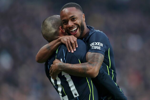 LONDON, ENGLAND - NOVEMBER 24:  David Silva celebrates after scoring his team's first goal with teammate Raheem Sterling during the Premier League match between West Ham United and Manchester City at London Stadium on November 24, 2018 in London, United Kingdom.  (Photo by Catherine Ivill/Getty Images)