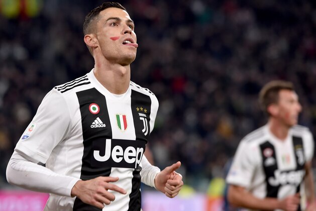 TURIN, ITALY - NOVEMBER 24: Cristiano Ronaldo of Juventus celebrates after scoring his sides first goal during the Serie A match between Juventus and SPAL at Allianz Stadium on November 24, 2018 in Turin, Italy. (Photo by Tullio M. Puglia/Getty Images)