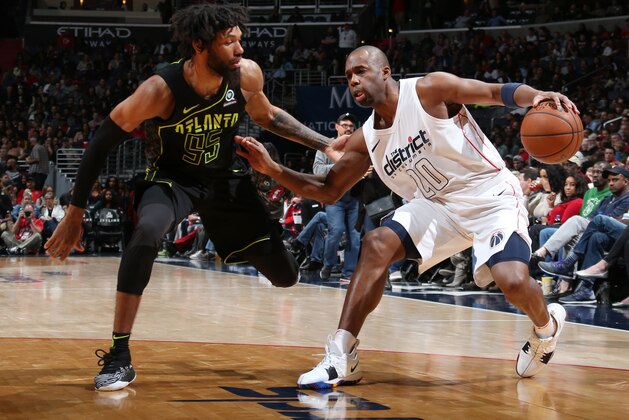 WASHINGTON, DC - APRIL 6:  Jodie Meeks #20 of the Washington Wizards handles the ball against DeAndre' Bembry #95 of the Atlanta Hawks on April 6, 2018 at Capital One Arena in Washington, DC. NOTE TO USER: User expressly acknowledges and agrees that, by downloading and or using this Photograph, user is consenting to the terms and conditions of the Getty Images License Agreement. Mandatory Copyright Notice: Copyright 2018 NBAE (Photo by Ned Dishman/NBAE via Getty Images)