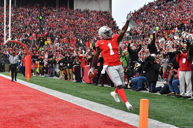 COLUMBUS, OH - NOVEMBER 24:  Johnnie Dixon #1 of the Ohio State Buckeyes celebrates in the end zone after catching a 31-yard touchdown pass in the second quarter against the Michigan Wolverines at Ohio Stadium on November 24, 2018 in Columbus, Ohio. Ohio State defeated Michigan 62-39.  (Photo by Jamie Sabau/Getty Images)