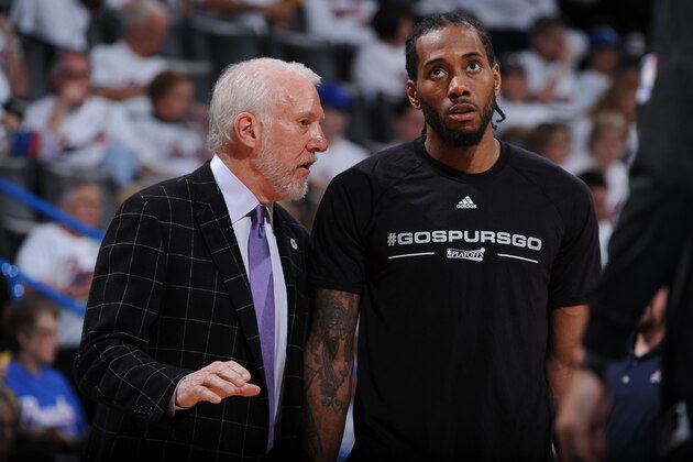 SSAN ANTONIO, TX - MAY 6: Gregg Popovich coaches Kawhi Leonard #2 of the San Antonio Spurs during the game against the Oklahoma City Thunder in Game Three of the Western Conference Semifinals of the 2016 NBA Playoffs on May 6, 2016 at the AT&T Center in San Antonio, Texas. NOTE TO USER: User expressly acknowledges and agrees that, by downloading and or using this photograph, user is consenting to the terms and conditions of the Getty Images License Agreement. Mandatory Copyright Notice: Copyright 2016 NBAE (Photo by Garrett W. Ellwood/NBAE via Getty Images)