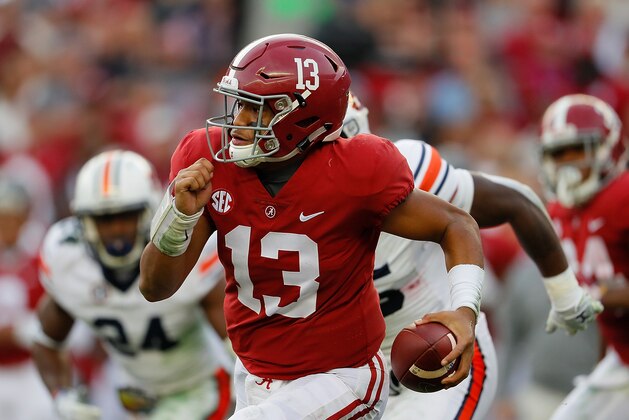 TUSCALOOSA, AL - NOVEMBER 24:  Tua Tagovailoa #13 of the Alabama Crimson Tide rushes against the Auburn Tigers at Bryant-Denny Stadium on November 24, 2018 in Tuscaloosa, Alabama.  (Photo by Kevin C. Cox/Getty Images)