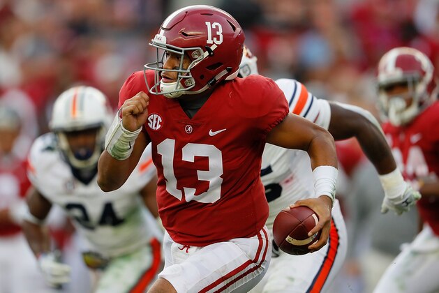 TUSCALOOSA, AL - NOVEMBER 24:  Tua Tagovailoa #13 of the Alabama Crimson Tide rushes against the Auburn Tigers at Bryant-Denny Stadium on November 24, 2018 in Tuscaloosa, Alabama.  (Photo by Kevin C. Cox/Getty Images)