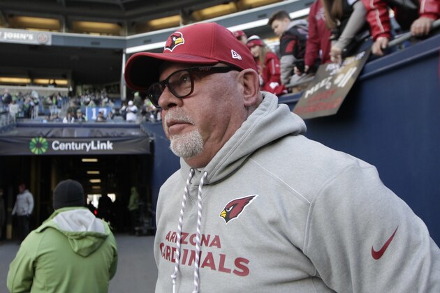 Arizona Cardinals head coach Bruce Arians looks out to the field before an NFL football game against the Seattle Seahawks, Sunday, Dec. 31, 2017, in Seattle. (AP Photo/John Froschauer)