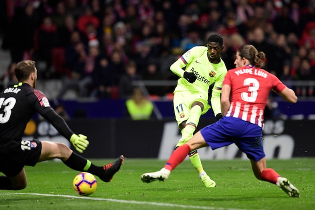 Barcelona's French forward Ousmane Dembele (C) scores a goal during the Spanish league football match between Club Atletico de Madrid and FC Barcelona at the Wanda Metropolitano stadium in Madrid on November 24, 2018. (Photo by JAVIER SORIANO / AFP)        (Photo credit should read JAVIER SORIANO/AFP/Getty Images)