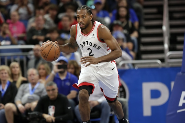 Toronto Raptors' Kawhi Leonard moves the ball against the Orlando Magic during the first half of an NBA basketball game, Tuesday, Nov. 20, 2018, in Orlando, Fla. (AP Photo/John Raoux) Toronto Raptors' Kawhi Leonard moves the ball against the Orlando Magic during the first half of an NBA basketball game, Tuesday, Nov. 20, 2018, in Orlando, Fla. (AP Photo/John Raoux)