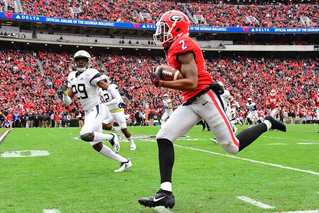 ATHENS, GA - NOVEMBER 24: Jayson Stanley #2 of the Georgia Bulldogs carries the ball in the second quarter against the Georgia Tech Yellow Jackets on November 24, 2018 at Sanford Stadium in Athens, Georgia. (Photo by Scott Cunningham/Getty Images)