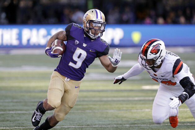 Washington tailback Myles Gaskin in action against Oregon State in an NCAA college football game Saturday, Nov. 17, 2018, in Seattle. Washington won 42-23. (AP Photo/Elaine Thompson)