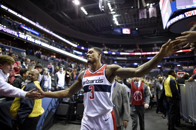 Washington Wizards guard Bradley Beal (3) leave the court after an NBA basketball game against the Los Angeles Clippers, Tuesday, Nov. 20, 2018, in Washington. The Wizards won 125-118. (AP Photo/Nick Wass)