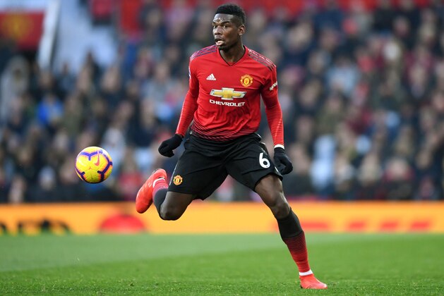 MANCHESTER, ENGLAND - NOVEMBER 24: Paul Pogba of Manchester United runs with the ball during the Premier League match between Manchester United and Crystal Palace at Old Trafford on November 24, 2018 in Manchester, United Kingdom. (Photo by Laurence Griffiths/Getty Images)