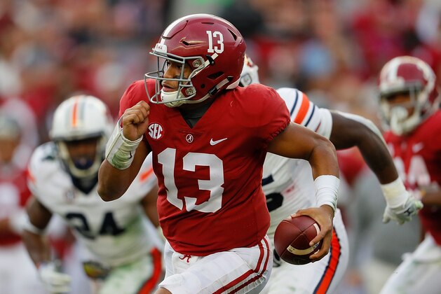TUSCALOOSA, AL - NOVEMBER 24:  Tua Tagovailoa #13 of the Alabama Crimson Tide rushes against the Auburn Tigers at Bryant-Denny Stadium on November 24, 2018 in Tuscaloosa, Alabama.  (Photo by Kevin C. Cox/Getty Images)