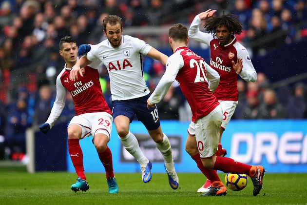 LONDON, ENGLAND - FEBRUARY 10: Granit Xhaka, Shkodran Mustafi both of Arsenal and Harry Kane of Tottenham Hotspur in action during the Premier League match between Tottenham Hotspur and Arsenal at Wembley Stadium on February 10, 2018 in London, England.  (Photo by Chris Brunskill Ltd/Getty Images)