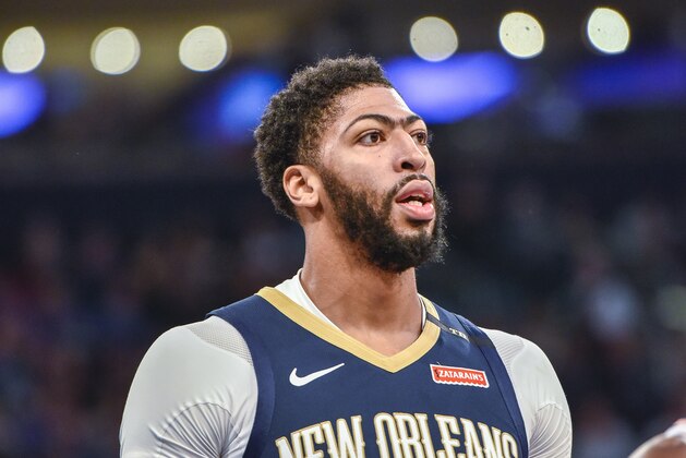 New Orleans Pelicans forward Anthony Davis (23) reacts after scoring in the first quarter of an NBA basketball game against the New York Knicks, Friday, Nov. 23, 2018, in New York. (AP Photo/Howard Simmons)