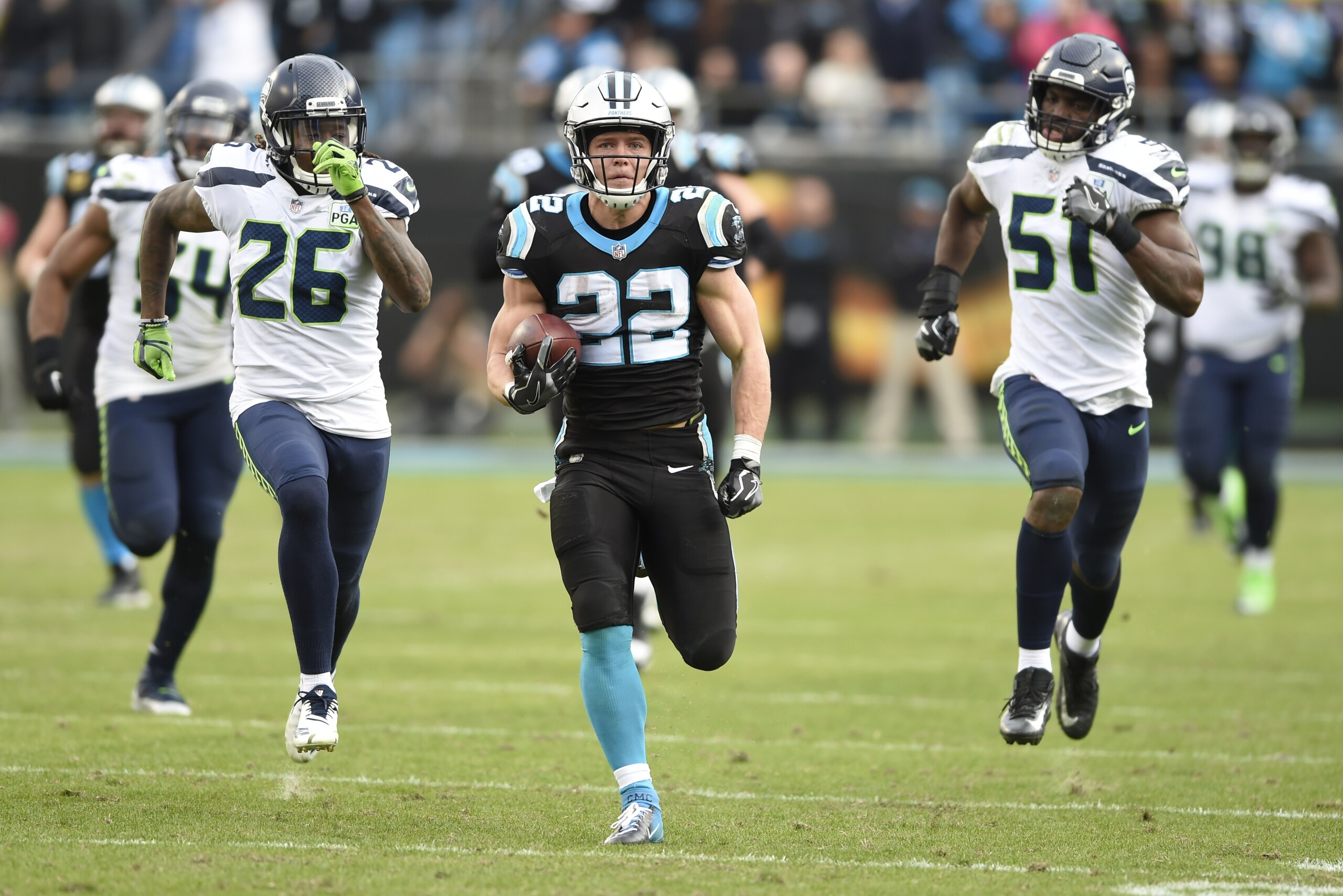 Carolina Panthers' Christian McCaffrey (22) runs for a long gain against the Seattle Seahawks during the second half of an NFL football game in Charlotte, N.C., Sunday, Nov. 25, 2018. (AP Photo/Mike McCarn) Carolina Panthers' Christian McCaffrey (22) runs for a long gain against the Seattle Seahawks during the second half of an NFL football game in Charlotte, N.C., Sunday, Nov. 25, 2018. (AP Photo/Mike McCarn)