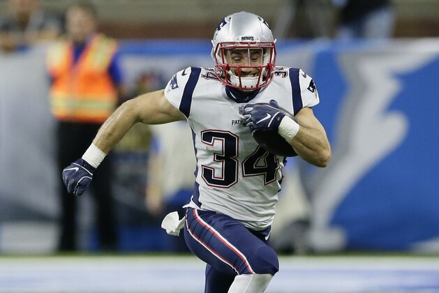New England Patriots running back Rex Burkhead carries during the first half of an NFL football game against the Detroit Lions, Sunday, Sept. 23, 2018, in Detroit. (AP Photo/Duane Burleson)