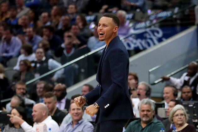 DALLAS, TX - NOVEMBER 17:  Stephen Curry #30 of the Golden State Warriors reacts as the Golden State Warriors score against the Dallas Mavericks in the first half at American Airlines Center on November 17, 2018 in Dallas, Texas. NOTE TO USER: User expressly acknowledges and agrees that, by downloading and or using this photograph, User is consenting to the terms and conditions of the Getty Images License Agreement.  (Photo by Tom Pennington/Getty Images)