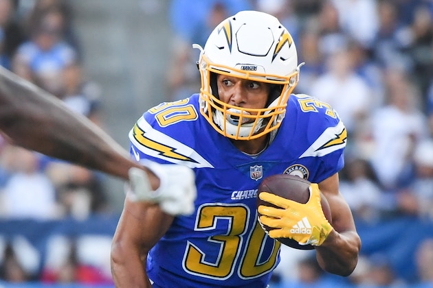 CARSON, CA - NOVEMBER 25: Running back Austin Ekeler #30 of the Los Angeles Chargers runs after his catch in front of defensive back David Amerson #38 of the Arizona Cardinals during the third quarter at StubHub Center on November 25, 2018 in Carson, California. (Photo by Harry How/Getty Images)
