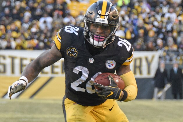 FILE - In this Jan. 14, 2018, file photo, Pittsburgh Steelers running back Le'Veon Bell (26) heads for the end zone after taking a pass from quarterback Ben Roethlisberger during the second half of an NFL divisional football AFC playoff game against the Jacksonville Jaguars, in Pittsburgh. The Le'Veon Bell watch is almost over for the Steelers. The star running back has until 4 p.m. on Tuesday, Nov. 13, 2018, afternoon to sign his one-year franchise tender and be eligible to play this season. (AP Photo/Don Wright, File)