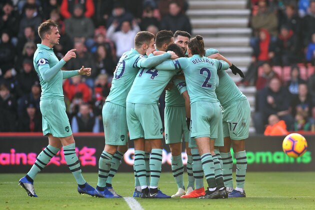 BOURNEMOUTH, ENGLAND - NOVEMBER 25:  Arsenal players celebrate after Jefferson Lerma of AFC Bournemouth (not pictured) scores an own goal during the Premier League match between AFC Bournemouth and Arsenal FC at Vitality Stadium on November 25, 2018 in Bournemouth, United Kingdom.  (Photo by Mike Hewitt/Getty Images)
