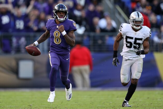 BALTIMORE, MARYLAND - NOVEMBER 25: Quarterback Lamar Jackson #8 of the Baltimore Ravens runs with the ball in the fourth quarter against the Oakland Raiders at M&T Bank Stadium on November 25, 2018 in Baltimore, Maryland. (Photo by Patrick Smith/Getty Images)