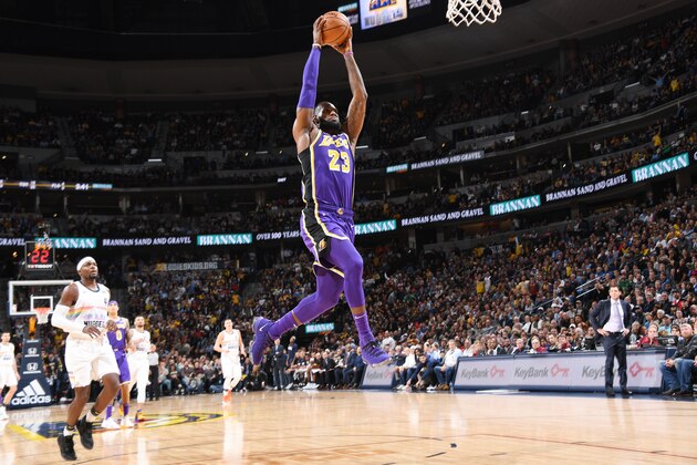 DENVER, CO - NOVEMBER 27: LeBron James #23 of the Los Angeles Lakers dunks the ball against the Denver Nuggets on November 27, 2018 at the Pepsi Center in Denver, Colorado. NOTE TO USER: User expressly acknowledges and agrees that, by downloading and/or using this Photograph, user is consenting to the terms and conditions of the Getty Images License Agreement. Mandatory Copyright Notice: Copyright 2018 NBAE (Photo by Andrew D. Bernstein/NBAE via Getty Images)