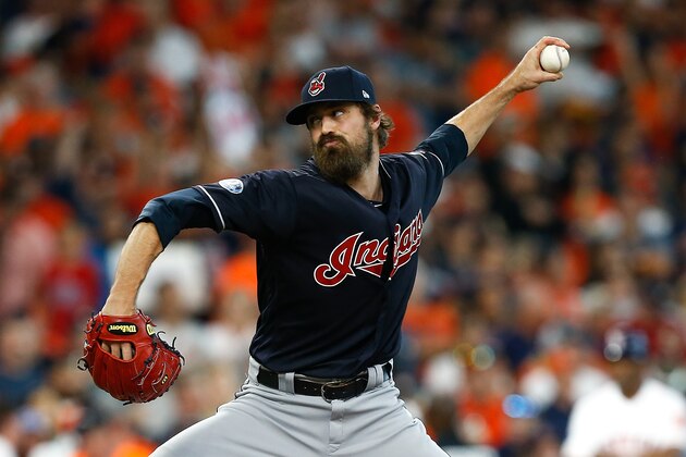HOUSTON, TX - OCTOBER 06:  Andrew Miller #24 of the Cleveland Indians delivers a pitch in the sixth inning against the Houston Astros during Game Two of the American League Division Series at Minute Maid Park on October 6, 2018 in Houston, Texas.  (Photo by Bob Levey/Getty Images)